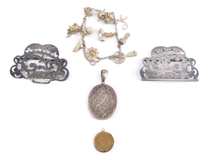 Various silver and other jewellery, an Edward VII silver buckle, in two sections with entwined scroll decoration and plain backs, Birmingham 1907, 5cm wide, charm bracelet, locket pendent half spade guinea type pendant etc. (a quantity)