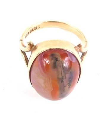 A 9ct gold dress ring, set with oval red agate stone, size N, 6.1g all in.