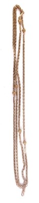 A longuard chain, with plain links broken by orbs, the clasp marked 9ct, 126cm long 26.5 g. - 3