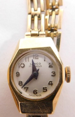 An Edwardian part pendant, with pearl surround, a 9ct gold cased wristwatch with Arabic dial, two unmarked cocktail watches and a heart shaped clasp with associated key. (a quantity) - 4