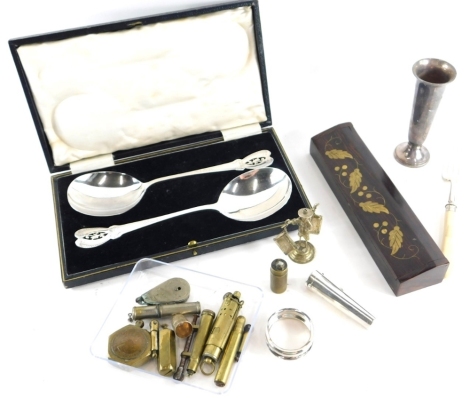 An Edward VII silver cigarette holder case, by Cornelius Dusormeaux Saunders & James Francis Hollings shepherd with gilt tipped meerschaum cigarette holder with tapering body and hinged lid, Chester 1901, a weighted specimen vase, napkin ring and figure o