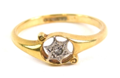 A 18ct gold dress ring, with central star set with small diamonds, on a shaped shank, ring size L-M, 3g all in.