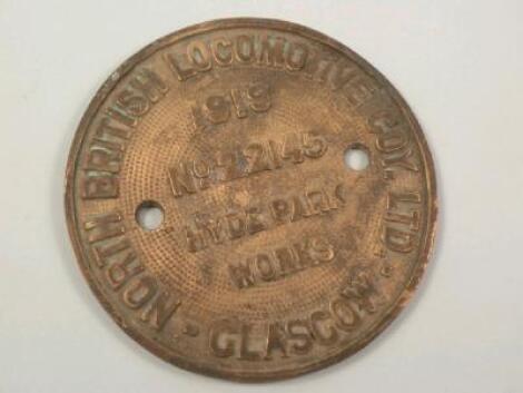 A circular brass plaque for the North British Locomotive Co Ltd Glasgow dated 1919