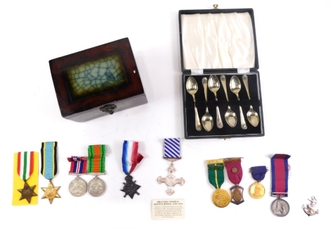 Various WWII style and other medals, Aircrew Europe Star, copies, one Victoria style and others, etc., 15cm wide, contained in a jewellery casket and a cased set of silver plated teaspoons (a quantity )