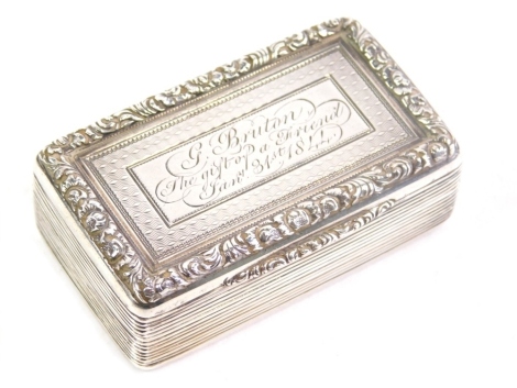 A Victorian silver snuff box, with chased decoration, scroll border and plain silver gilt interior, engraved lid, London 1842, 6cm wide, 1.9oz.