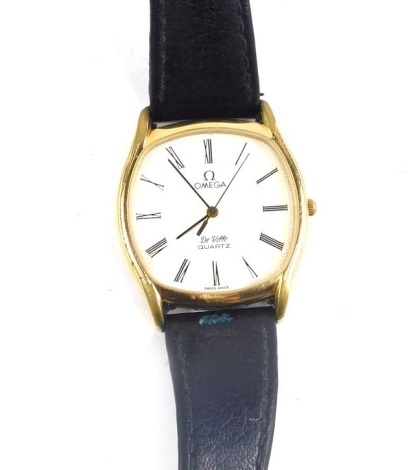 An Omega De Ville quartz wristwatch, with 3cm wide Roman numeric dial and associated strap. (AF)