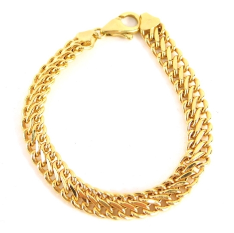 A fancy yellow metal S link bracelet, 18cm long marked 375, 6.9g.