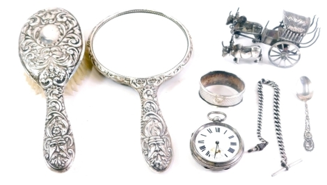 Various silver, two piece dressing table set, comprising hand mirror, 23cm wide, and hairbrush, white metal cart pulled by two ox, probably Chinese, 8cm high, napkin ring, open faced pocket watch, Chester 1900, etc. (a quantity)