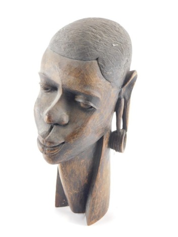 A 20thC African hardwood tribal head, with shaped neck, 33cm high.