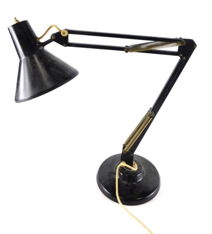 A vintage Anglepoise lamp, with black metal cone shaped shade 15cm long, articulated stem and circular stepped foot. WARNING! This lot contains untested or unsafe electrical items.  It is supplied for scrap or re-conditioning only. TRADE ONLY