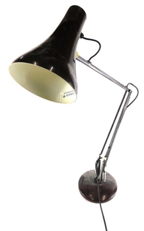 A vintage Anglepoise lamp, with cone shaped shade, articulated stem and circular foot, 67cm high.