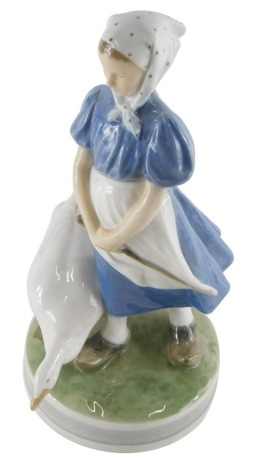 A Royal Copenhagen figure of a girl aside goose, number 527 UF, printed marks beneath, 27cm high.