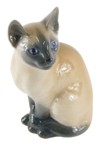 A Royal Copenhagen figure of a Siamese Cat TM, number 3281 OK, printed marks beneath, 20cm high.