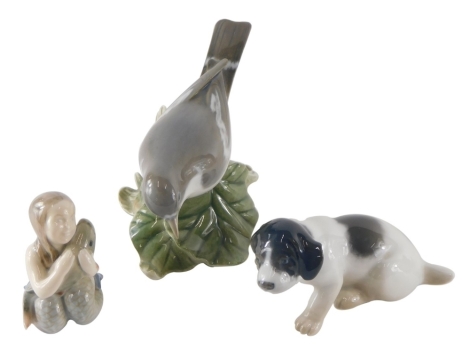 Various Royal Copenhagen and similar figures, puppy, birds, and mermaid holding fish, number 2348, 7cm high. (3)