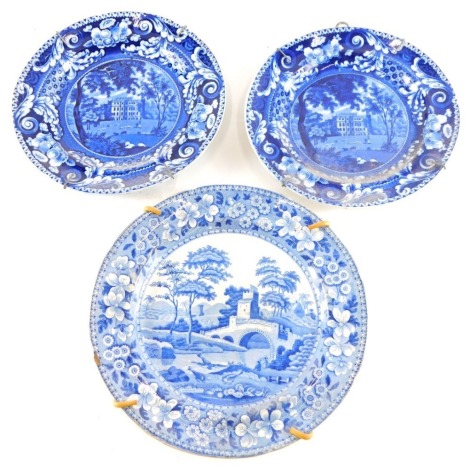 A pair of early 19thC pearlware Riley plates, Kings Western Gloucestershire scenes, and another 19thC Spode blue and white plate, 24cm wide. (3)