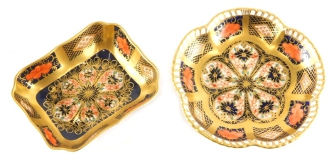 A Royal Crown Derby Imari pattern pin dish, 10cm wide, and a floral shaped dish. (2)