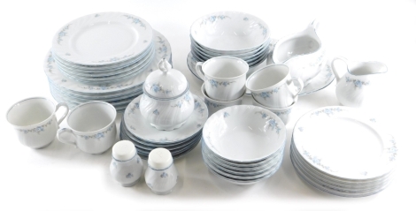 A Seltmann Weiden Bavarian porcelain part dinner and tea service, decorated with blue and grey flowers.