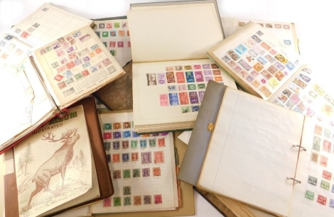 Various stamps, stamp albums, etc., a quantity to include a red album containing various Lithuania, Tuva triangular and diamond shaped stamps, large size, etc., various Denmark, world used, Hungary, various others. (a large quantity)