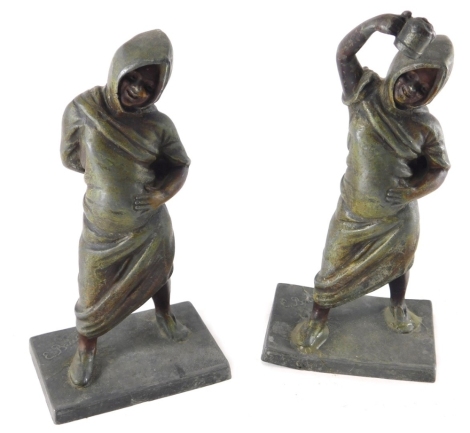 A pair of early 20thC bronze figures, each in flowing robes once holding cups, one with etched numbers beneath, 18cm high.