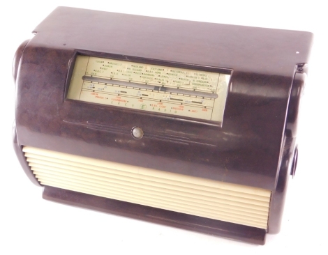 A mid 20thC Bakelite Ekco type U76 radio receiver, in shaped case, 35cm wide.