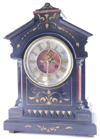 A 19thC black slate and marble mantel clock, in architectural case, with 17cm diameter Roman numeric dial, flanked by quarter columns on a stepped base, the body inset with flowers with eight day movement, 49cm high.