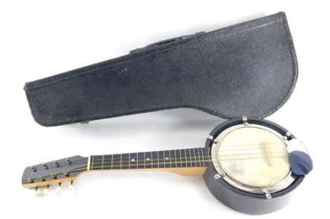 A Jetel banjolele, numbered 2, with chrome mounts and resin stops, 56cm long.