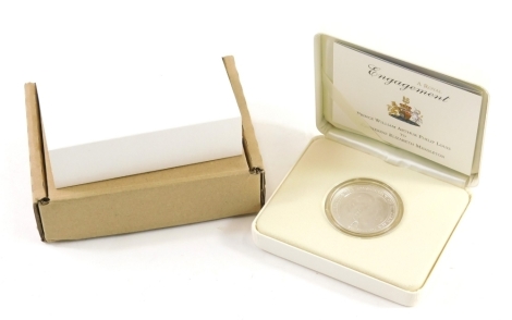 A Royal Mint Royal Engagement silver proof coin, Prince William and Catherine Middleton, with paperwork, box and outer packaging.