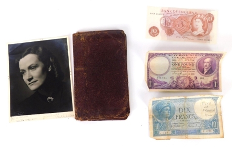 A photograph of the singer Kathleen Ferrier (1912-1953), signed and with personal inscription, programme and further photograph, together with three banknotes and a wallet.