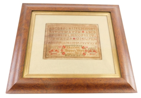 A George IV alphabetic sampler, by Elizabeth Hopper 1822, set with baskets of fruit, 19cm x 24cm, mounted glazed and framed.