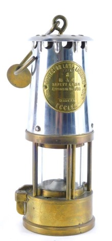 An Eccles Six miner's lamp, in brass and chrome plated case, with S scroll handle, 27cm high.