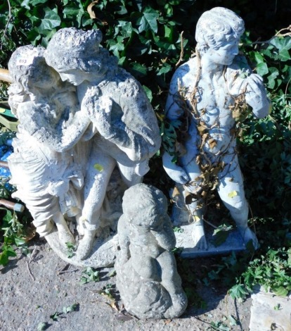 A composition stone statue, two figures, in French style, 71cm high, a composition statue of David, 73cm high and a small figure of a child, 36cm high.