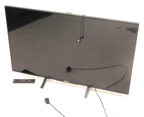 A Sony 48" LCD television with remote and cable. 