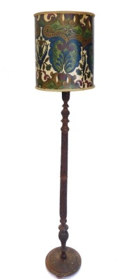 An Eastern carved hardwood standard lamp, with shade, 189cm high overall.