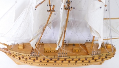 A scratch built model of an 18th or 19thC three masted war ship, 90cm long. - 2