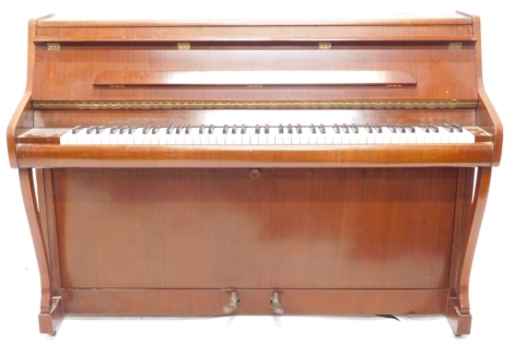 A low mahogany upright piano by Bentley, 99cm high, 138cm wide.