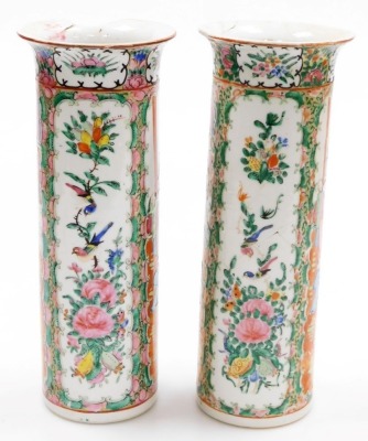 A pair of Cantonese famille rose porcelain vases, with flared rims, decorated with reserves of figures, flowers, birds, etc., 30cm high (AF), and a 19thC pottery figure of a dog of fo, 11cm high. (AF) - 3