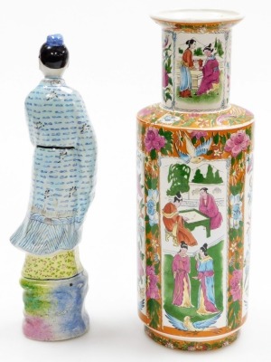 An Oriental porcelain vase, of cylindrical shouldered form, decorated with repeat reserves of figures, flowers, butterflies, etc., 33cm high, and a pottery figure of a deity, 32cm high. (2) - 3