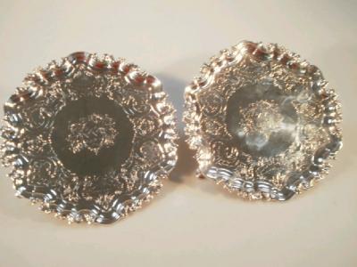 A pair of George II Irish salvers of shaped hexagonal form