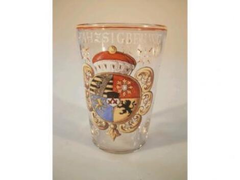 A 19thC flared glass beaker decorated with German coats of arms and dated 1627