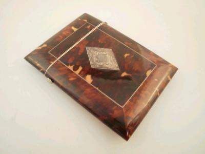 A 19thC tortoiseshell rectangular card case with diamond cartouche