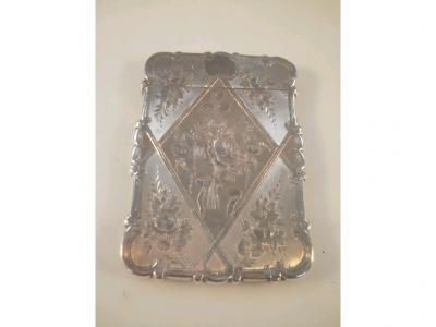 A Victorian silver card case engraved with flowers and a lady looking out to a ship