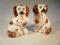 A pair of late 19thC pottery spaniels