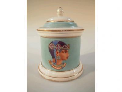 A late 19thC tobacco jar decorated with transfer prints of Egyptians