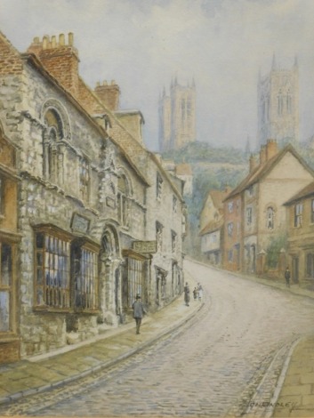 Findley (20thC). Steep Hill, Lincoln Cathedral in the distance, watercolour, signed, 27cm x 20cm.