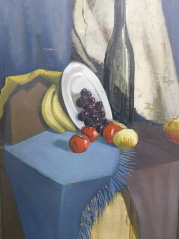 T. Elliott (20thC). Still life bottle and fruit on a table, oil on canvas, signed, 62cm x 46cm.