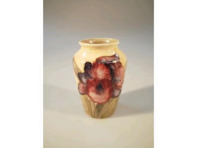 A small Moorcroft baluster vase decorated with the Bearded Iris pattern