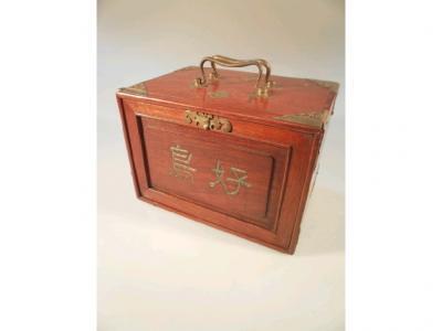 A Chinese hardwood cased brass bound Mah Jong set with carrying handle