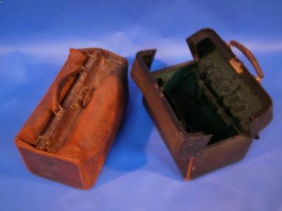 A leather travelling case with fitted interior (af) and a Gladstone style leather bag (af)
