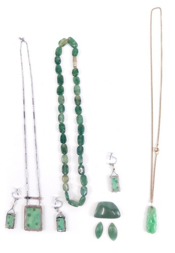 Various jade and jade coloured jewellery, a pendant 3cm high, attached to a slender link necklace, further green stones etc. (a quantity)