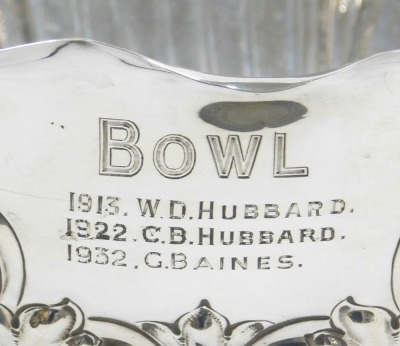 An Edward VII silver presentation bowl, The Sleaford Croquet Club Lincolnshire Championship Challenge bowl, of semi fluted form, embossed with foliate scrolls and shell motifs, engraved with an armorial and the winners from 1907-1932, Atkin Brothers, Shef - 5